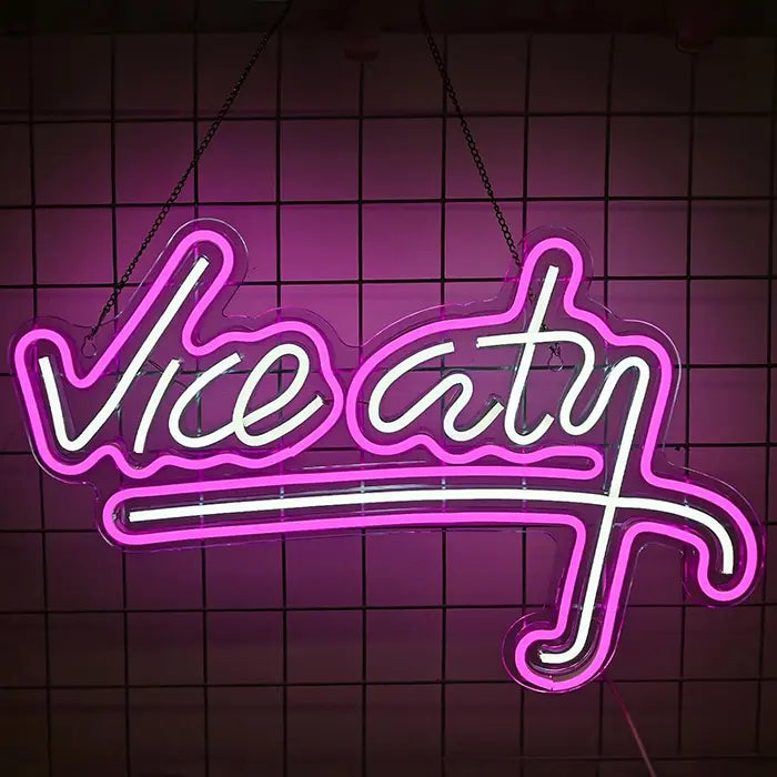 Vice City Original Neon LED Sign front view against a tiled wall, the Vice City lettering from GTA with a sweeping underline in pink