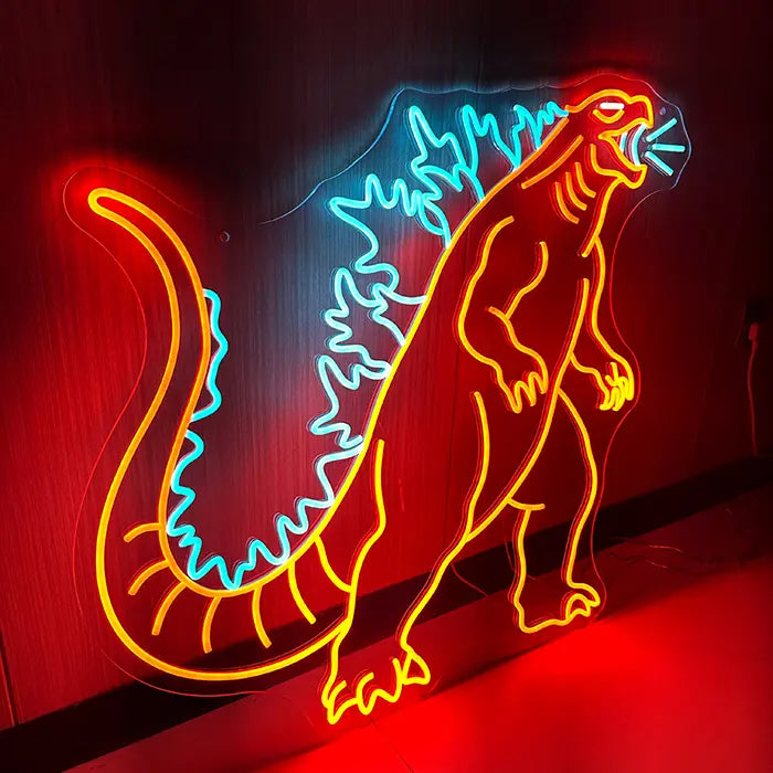 Monsterechse Neon LED Schild schräg fotografiert, gesamtes Motiv leuchtet orange, Rückenkamm in Hellblau