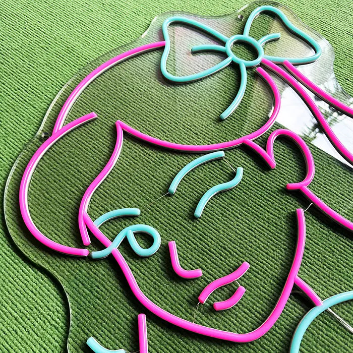 Mindy Bunny neon LED sign, evenly lit neon line across the full width of the design