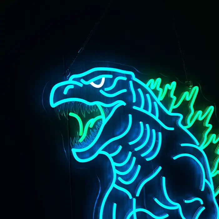 Godzilla Neon LED Sign hanging on the wall, the hanger and cable running up and away