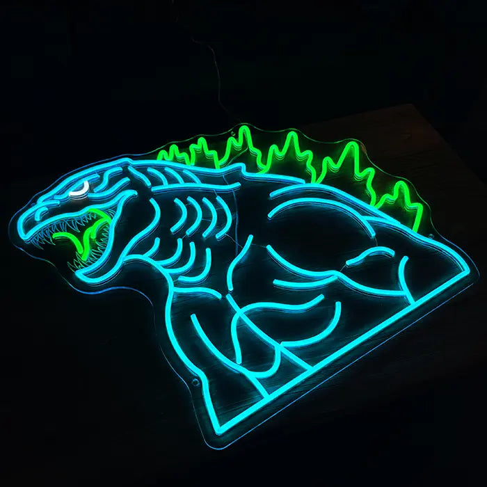 Godzilla Neon LED Sign standing at an angle on a surface, the clear acrylic edge following the contour