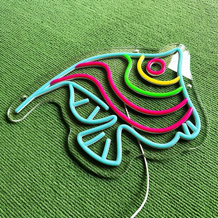 Ocean Fish Neon LED Sign switched off at an angle from above, neon tubing on contour-cut acrylic