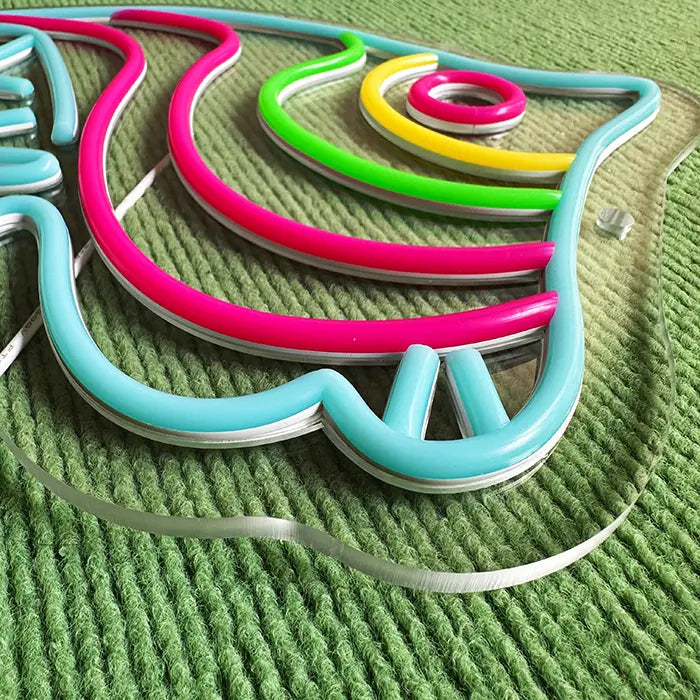 Ocean Fish Neon LED Sign switched off in close-up, tubing and the acrylic edge from the side