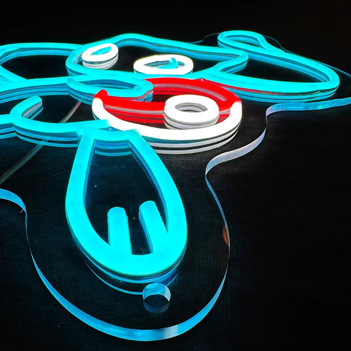 Pokémon Mew Neon LED Sign in blue at an angle from above, neon tube and tail on the clear acrylic panel