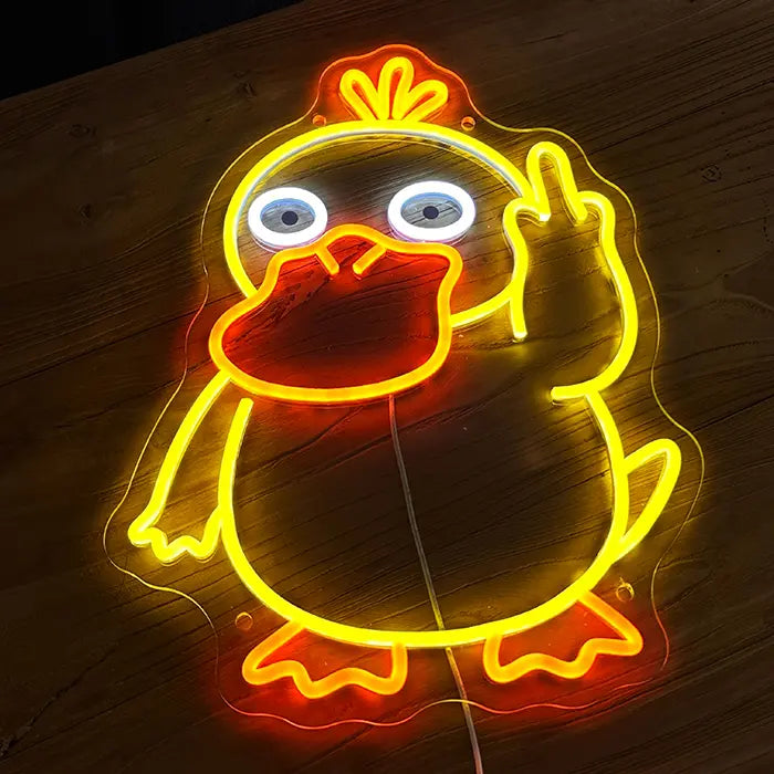 Pokémon Psyduck Middle Finger Neon LED Sign on a wooden wall, a warm glow on the wood