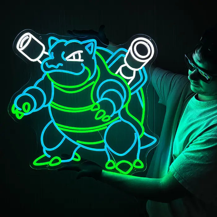 Pokémon Blastoise Neon LED Sign, Space Edition, held against the wall from the side by a person