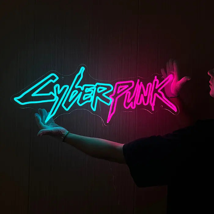 CYBERPUNK Neon LED Sign aligned on the wall, the flowing lettering glowing strongly