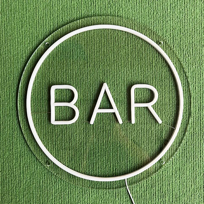BAR Neon LED Sign switched off from the front, round acrylic panel with neon circle and the word BAR