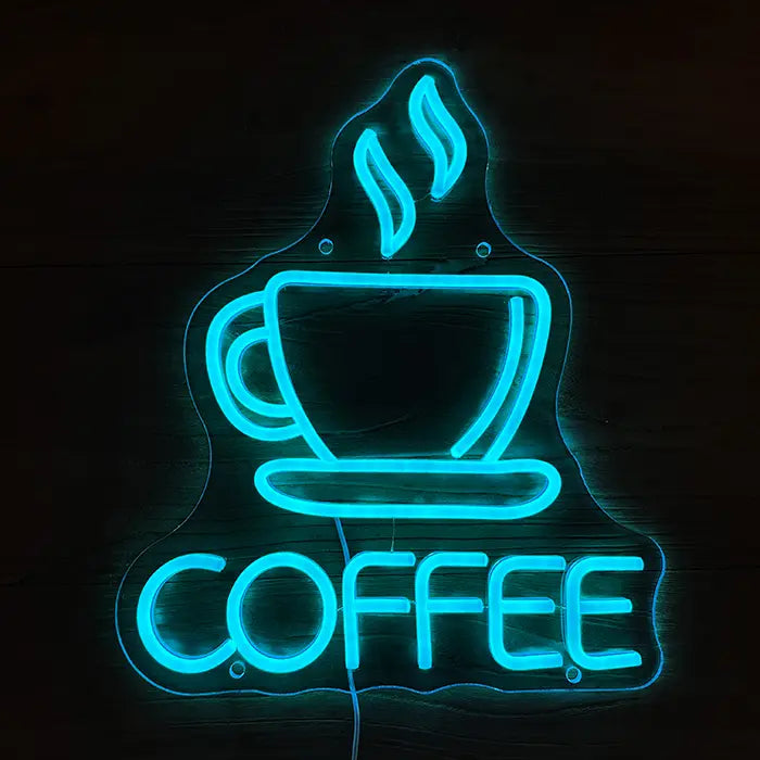 Coffee Cup Neon LED Sign lit from the front, cup with steam and lettering in ice blue