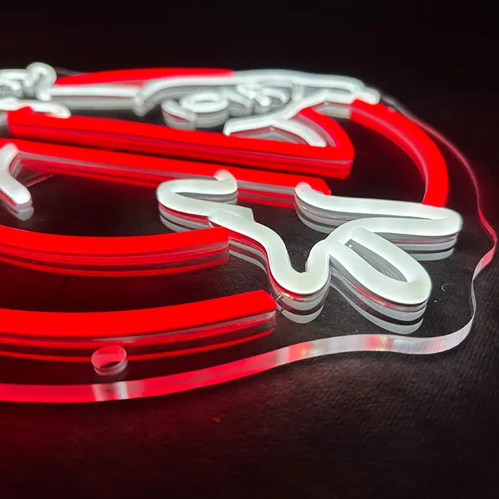 Ghostbusters Logo Neon LED Sign in close-up at an angle, red and white neon tubes on acrylic