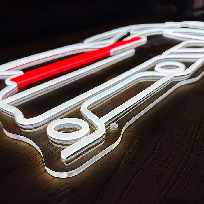 GT Sports Car Neon LED Sign from above at an angle, white body lines and red tail light on acrylic