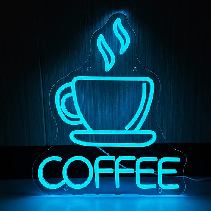 Coffee Cup Neon LED Sign front view against a dark wooden wall, steaming cup above the word COFFEE