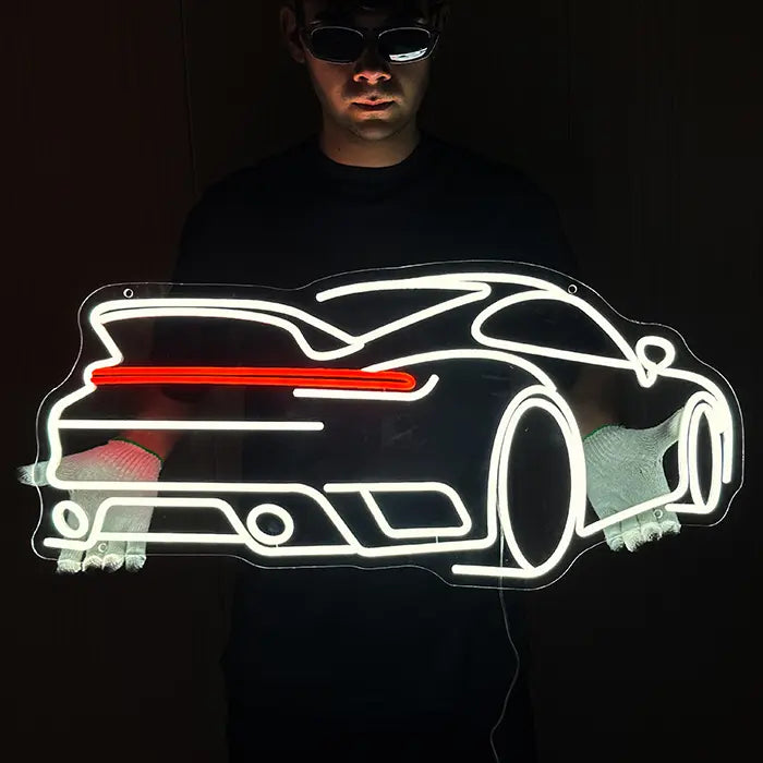 GT Sports Car Neon LED Sign held in front of the body with gloves