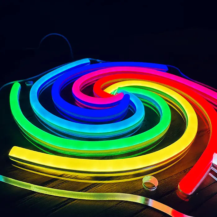 Lollipop Neon LED Sign lying flat in close-up, neon tubes in blue, green, yellow and red