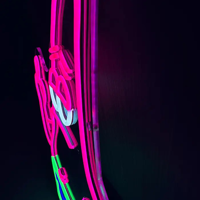 Patrick Middle Finger Neon LED Sign from the side on the wall, neon tubes raised on the panel