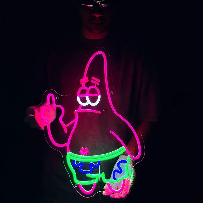 Patrick Middle Finger Neon LED Sign held in front of the body with gloves