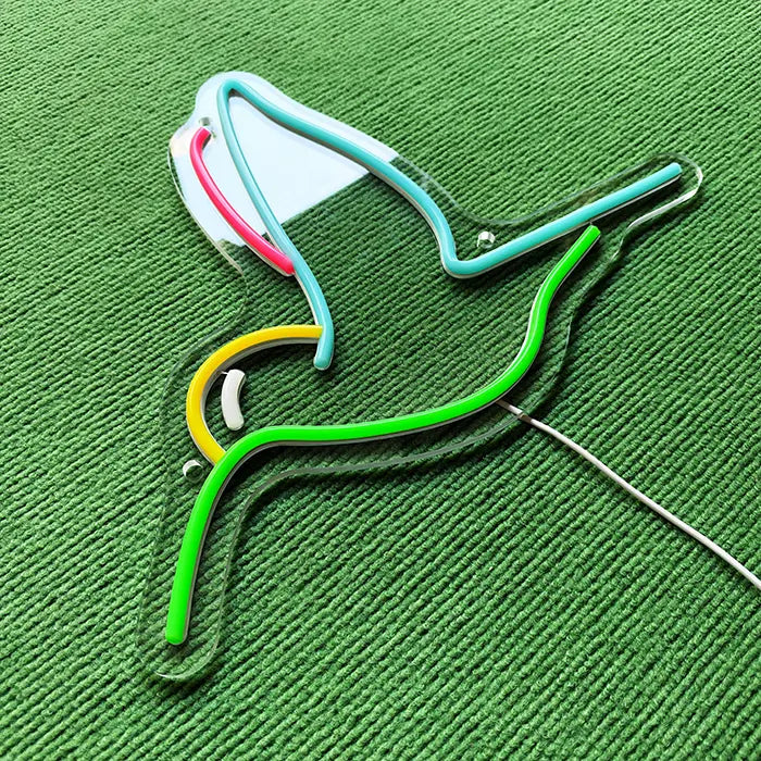 Hummingbird Bird Neon LED Sign switched off from above at an angle, neon tubes on the acrylic panel