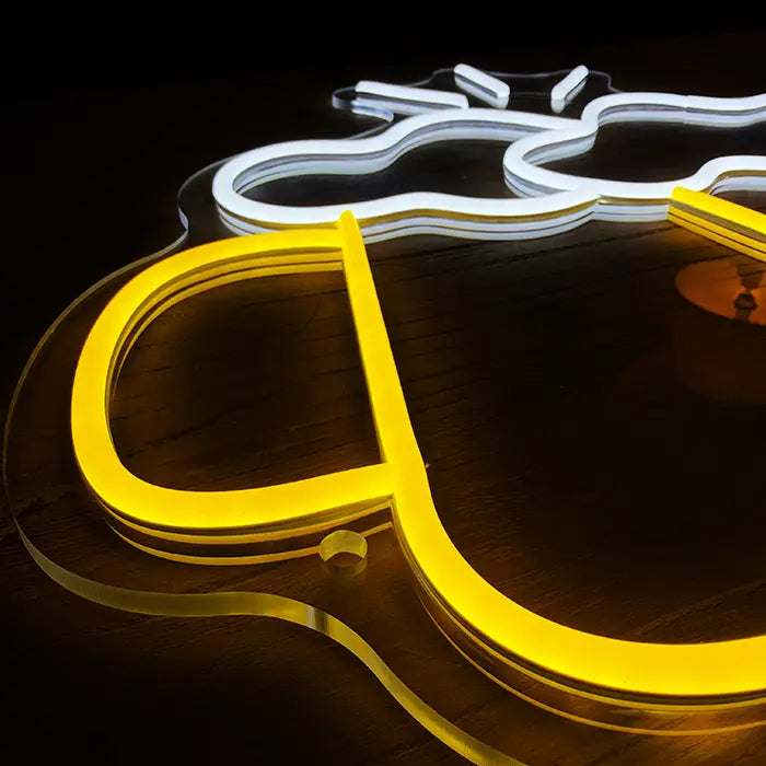 Beer Steins Neon LED Sign in macro shot, yellow handle and white foam on clear acrylic