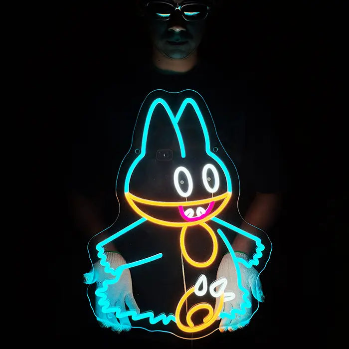 Pokémon Munchlax Neon LED Sign held in front of the body by a man wearing gloves