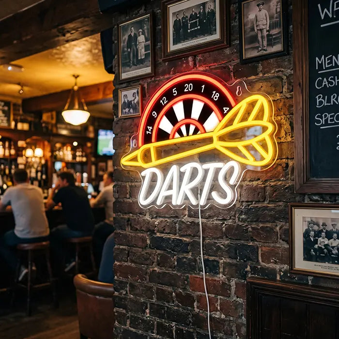 Darts Neon LED Sign with UV Print on a brick wall in a pub between old photos, guests at the bar beside