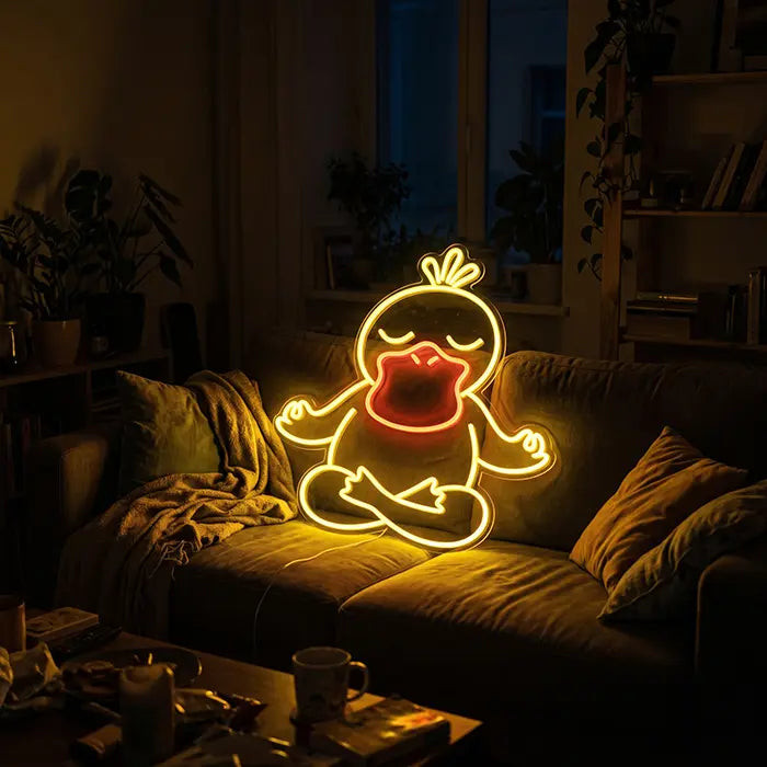 Pokémon Psyduck in Meditation Set Neon LED Sign, design Good Vibes Psyduck: set up on a dark sofa, a coffee table with a mug in front