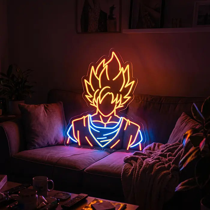Super Saiyan Anime Hero Neon LED Sign above a dark sofa, a coffee table with a mug in front