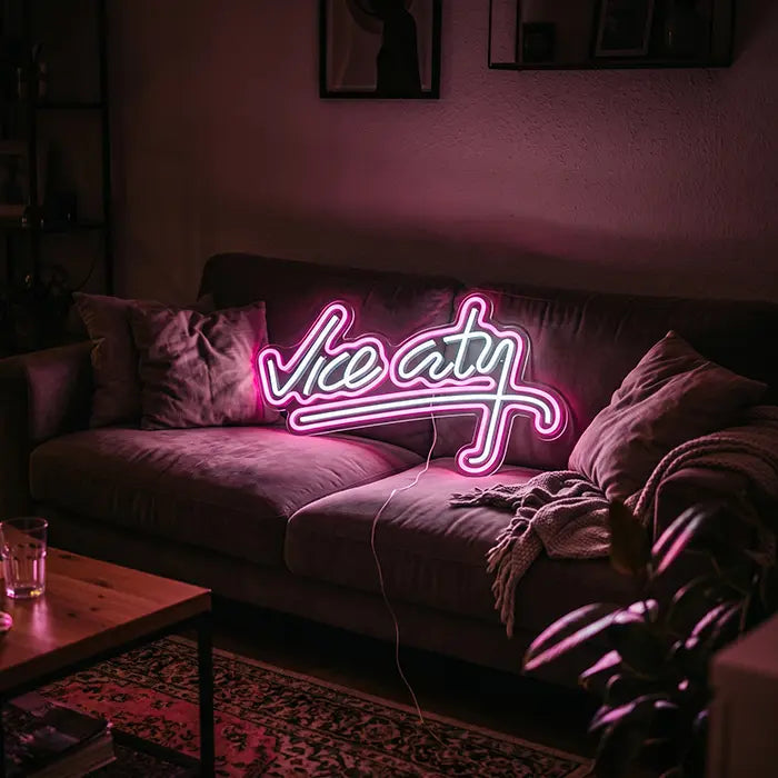 Vice City Original Neon LED Sign on a sofa between cushions