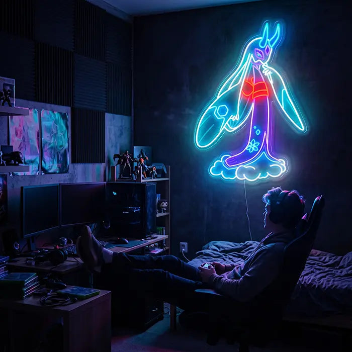 Pokémon Mega Froslass Neon LED Sign above a gaming desk, a man in a gaming chair in front