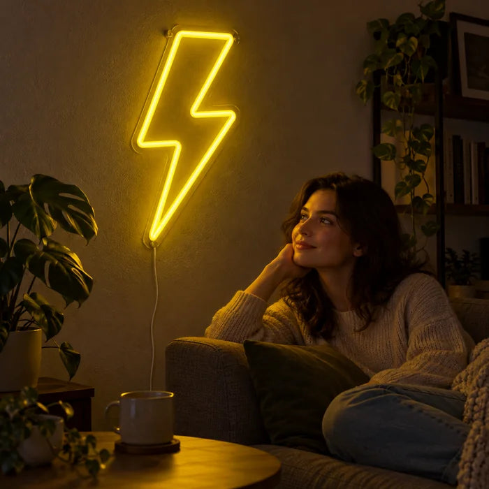 Lightning Bolt Neon LED Sign on a living room wall, a person relaxing on the sofa in front of it