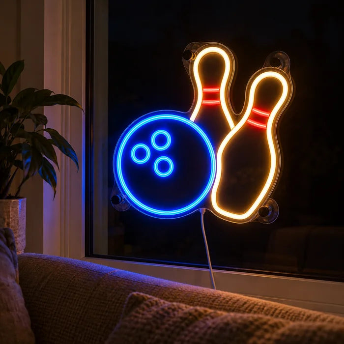 Bowling Night Neon LED Sign in the window of a cosy living room in the evening