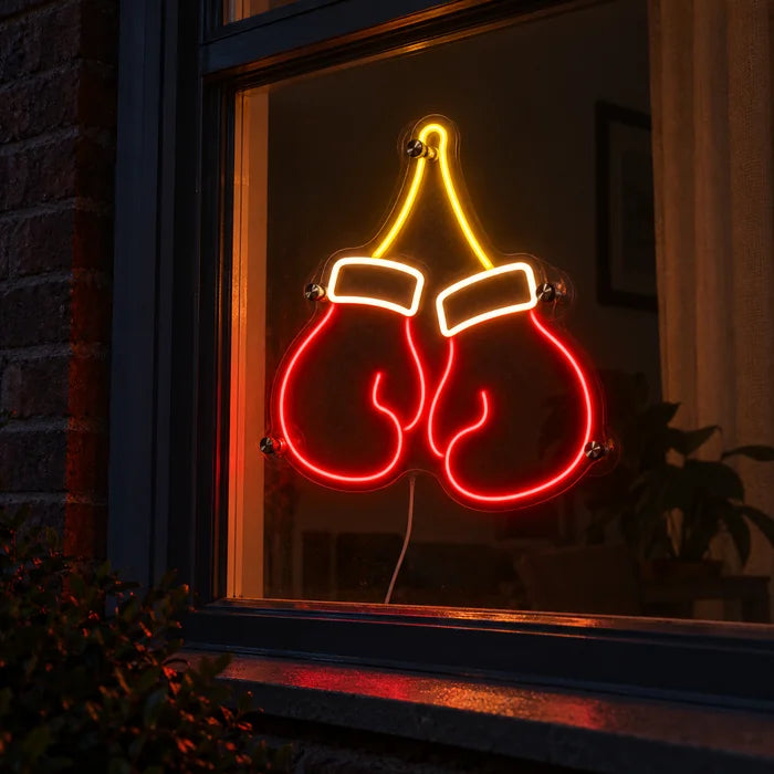 Boxing Gloves Neon LED Sign in a window, seen from the street at night