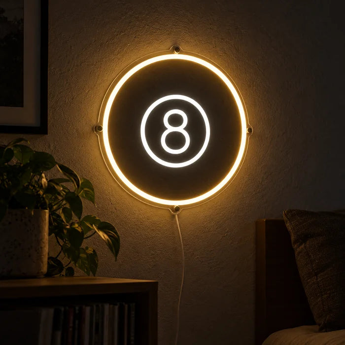 Black Eight Ball Neon LED Sign glowing on a dark wall, close-up with connection cable