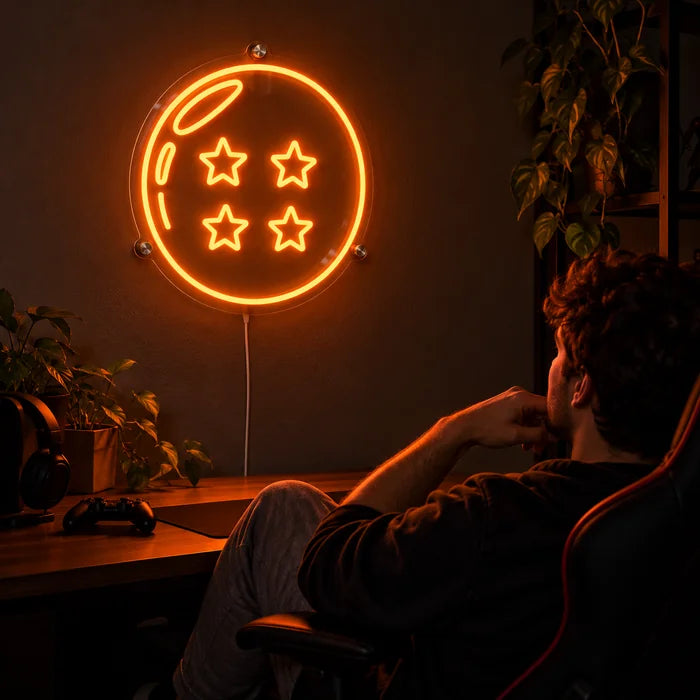 Neon LED-skilt Dragon Ball Firestjernekule over gamingskrivebordet, foran en spiller i gamingstolen