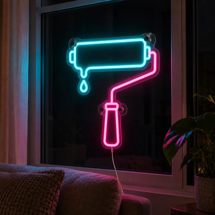 Paint Roller Neon LED Sign in the window of a cosy living room in the evening