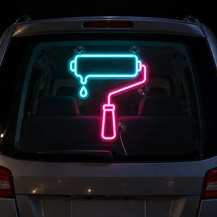 Paint Roller Neon LED Sign on the rear window of a car at night
