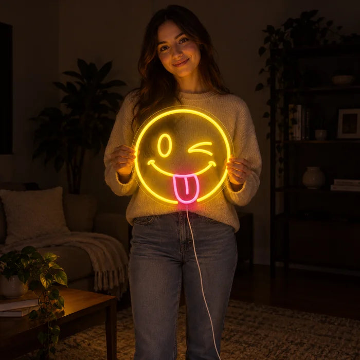 Cheeky Smiley Neon LED Sign held by a woman, showing its size compared to her body