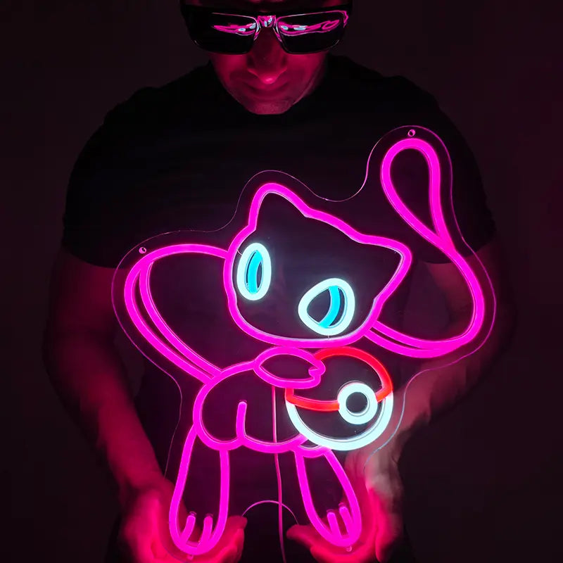 Detaillierte Neon-Silhouette von Mew mit hellblau leuchtenden Augen und einem klassischen Pokeball-Symbol.