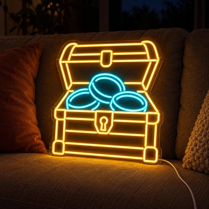 Gold Treasure Neon LED Sign on a cosy sofa between cushions and a throw