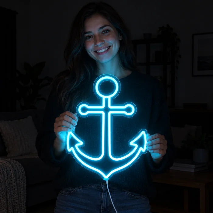 Harbour Anchor Neon LED Sign held by a smiling woman against a dark background