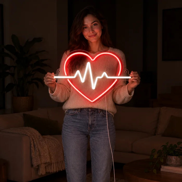 Heartbeat Neon LED Sign held by a woman, showing its size compared to her body