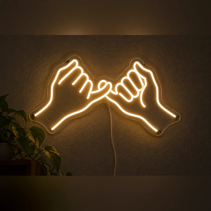 Pinky Promise Neon LED Sign glowing on a dark wall, close-up with connection cable