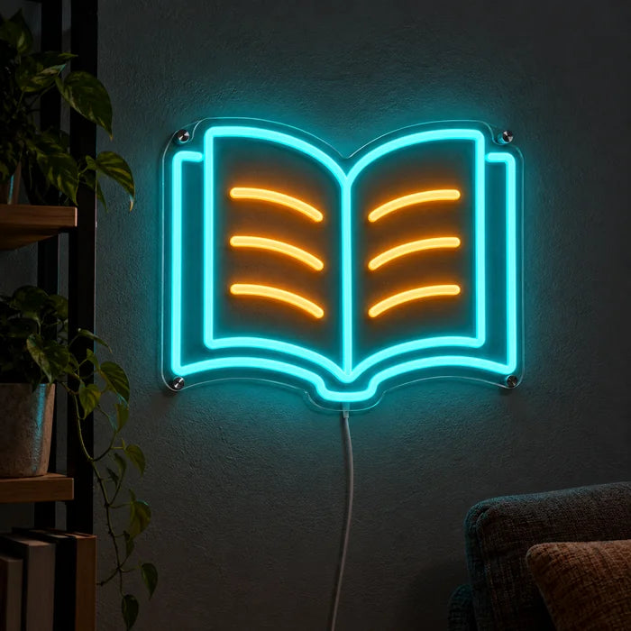 Læsebog neon LED skilt lysende på en mørk væg, nærbillede med tilslutningskabel