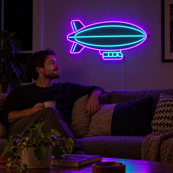 Airship Neon LED Sign on a living room wall, a person relaxing on the sofa in front of it