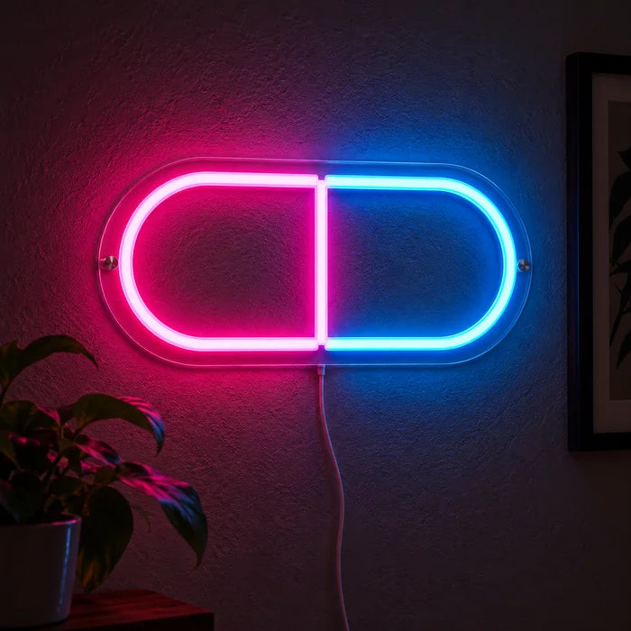 Neonová LED cedule Kapsle léku svítící na tmavé stěně, detail s přívodním kabelem