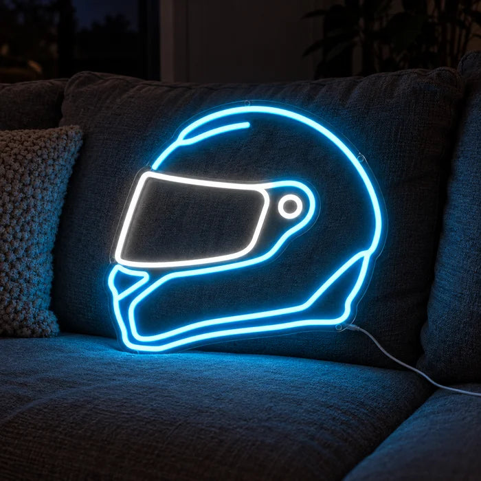 Neon Racing Helmet Neon LED Sign on a cosy sofa between cushions and a throw