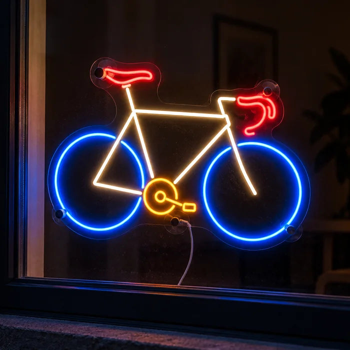 Neon Road Bike Neon LED Sign in a window, seen from the street at night