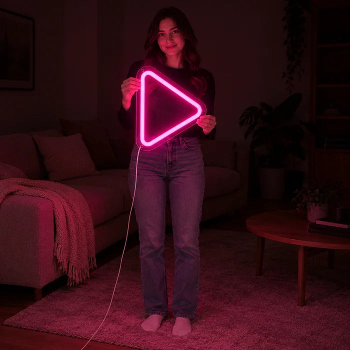 Play Button Neon LED Sign held by a woman, showing its size compared to her body