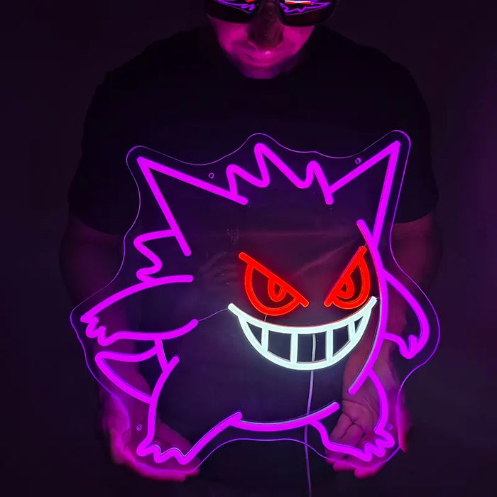 Pokémon Gengar Neon LED Sign glowing purple against a dark background, with orange eyes and a wide grin