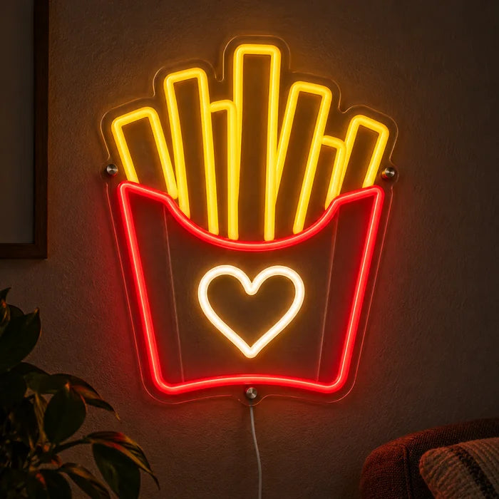 Fries Love Neon LED Sign glowing on a dark wall, close-up with connection cable