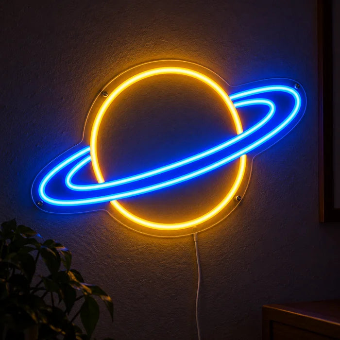 Ringed Planet Neon LED Sign glowing on a dark wall, close-up with connection cable